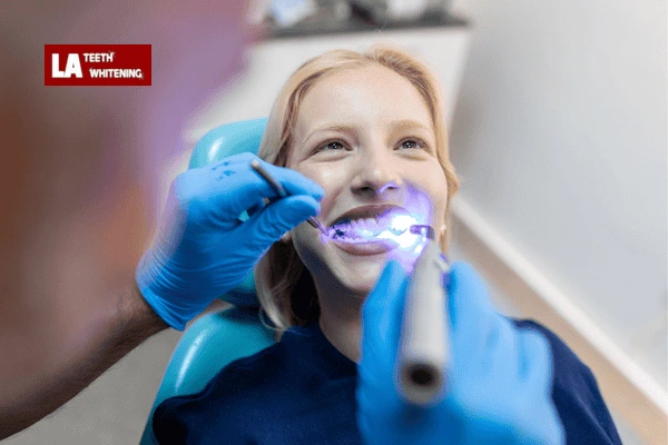 Lazer teeth whitening procedure in progress at a dental clinic, showing a patient receiving treatment with a specialized lazer device Windsor