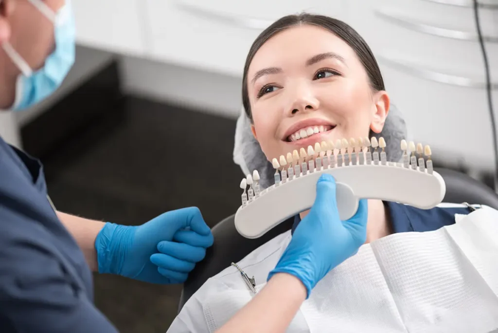 Patient experiencing Laser Teeth Whitening while wearing protective eyewear Windsor